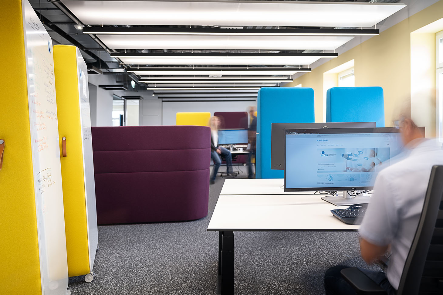 Employees at their workplace in the New Business Incubator