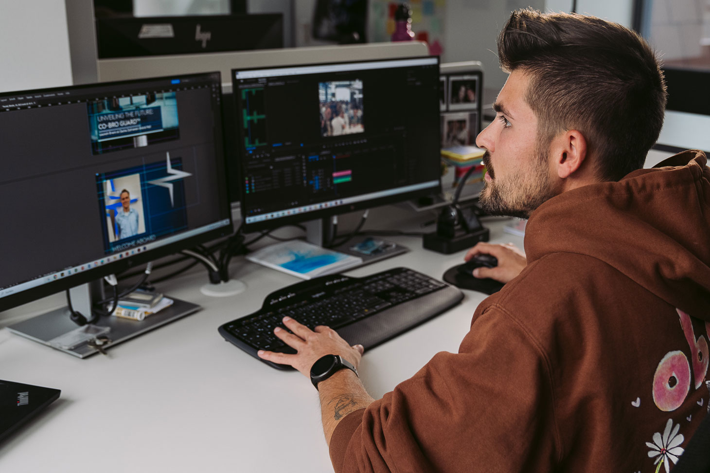 Michael works on the computer editing a video