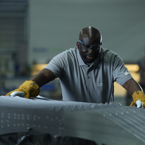 POC employee at voestalpine works on a steel component