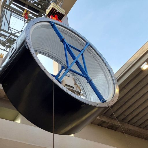 Placing a stator with wound-up electrical steel in a generator at the Danube power plant in Ottensheim